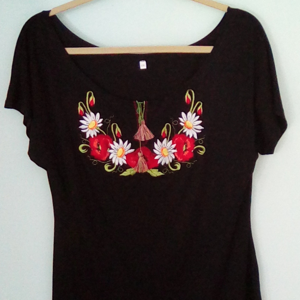 Black embroidered flower top with tassels
